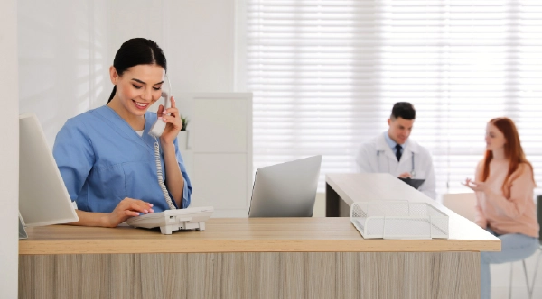 medical assistants working in a healthcare office after completing a medical assistant training program