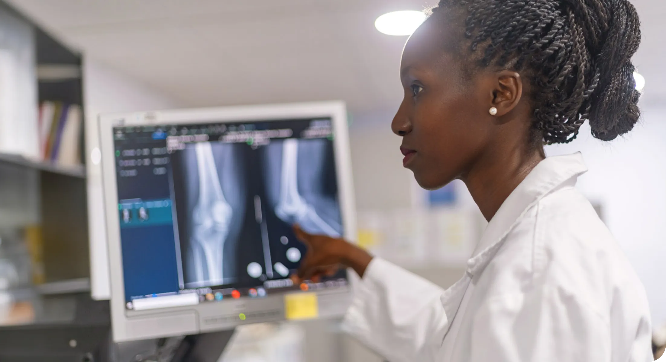 A healthcare professional focuses on X-Ray imaging