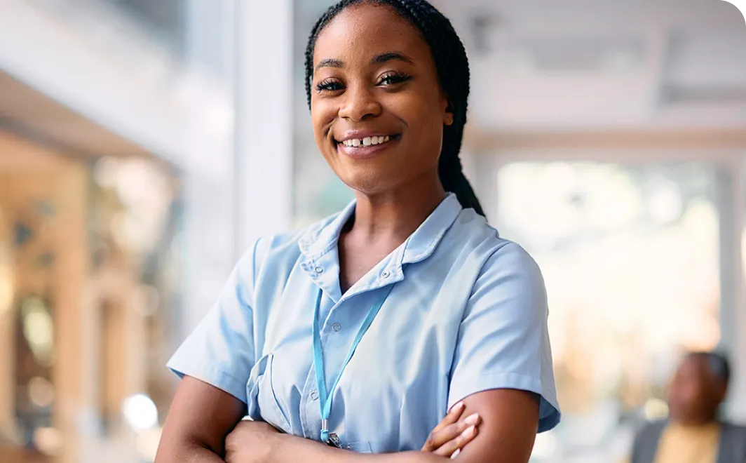 A healthcare professional smiling