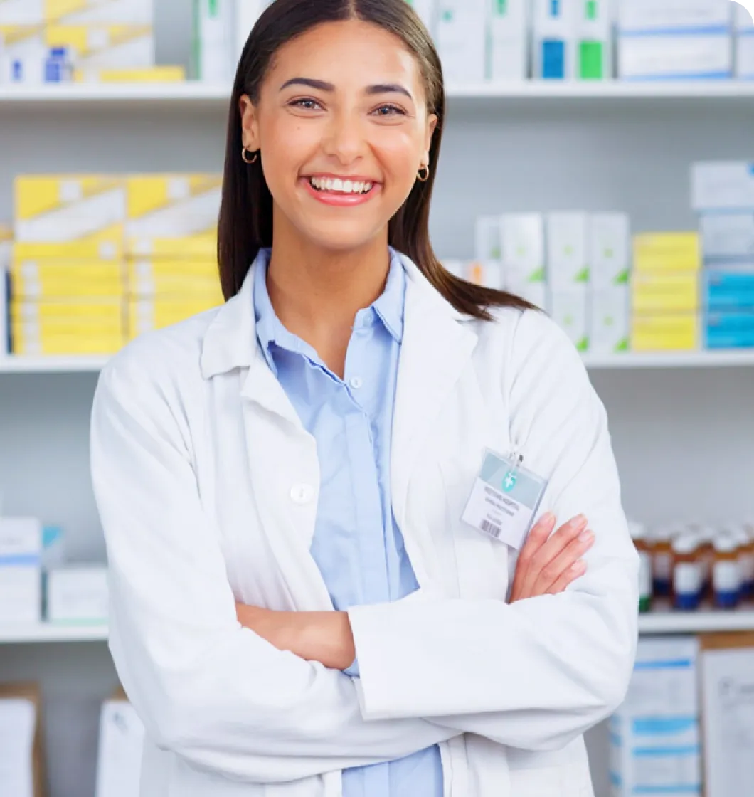 A woman smiling in a pharmacy